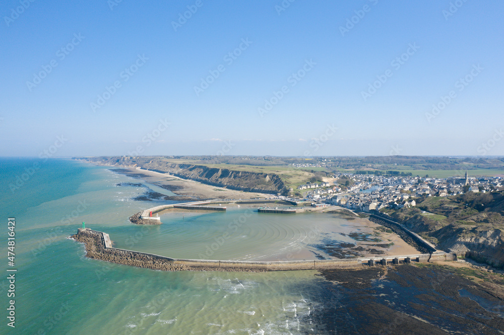 Wall mural The port and town of Port en Bessin on the English Channel in Europe, France, Normandy, towards Omaha beach, in spring, on a sunny day.