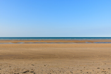 Omaha beach facing the English Channel in Europe, France, Normandy, towards Arromanches, Colleville, in spring, on a sunny day.