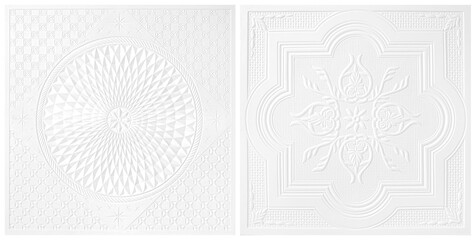 White Patterns on the ceiling gypsum sheets two style of white flowers  isolated  on white...