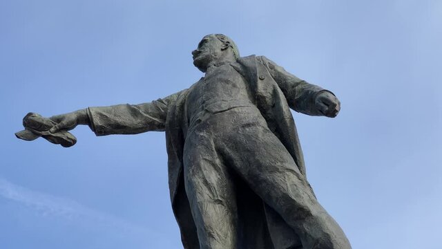 monument to Lenin against the blue sky