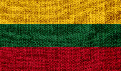 Lithuania flag on knitted fabric - obrazy, fototapety, plakaty