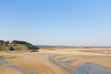Fototapeta na wymiar La Potiniere Beach facing the town of Barneville Carteret in Europe, France, Normandy, Manche, in spring, on a sunny day.