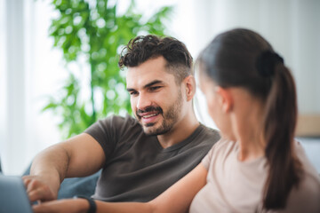 Obraz premium man and woman couple person are working together with laptop from home
