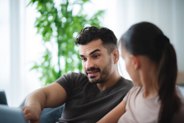 Fototapeta premium man and woman couple person are working together with laptop from home