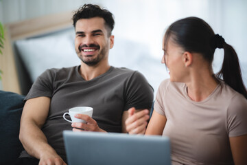 man and woman couple person are working together with laptop from home