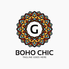 Fototapeta premium letter G boho chic round decoration vintage color mandala vector logo design element