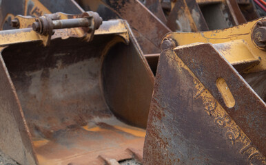 close up of an rusty excavator buckets