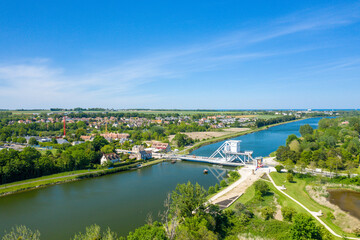 Fototapeta na wymiar The Pegasus Bridge also called the Pegasus Bridge in Europe, France, Normandy, towards Caen, Ranville, in summer, on a sunny day.