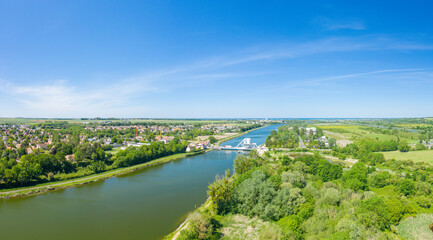 The panoramic view on the Pegasus Bridge in Europe, in France, in Normandy, towards Caen, in Ranville, in summer, on a sunny day.