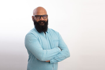 Fototapeta premium happy Indian Healthy middle aged man with Folding arms