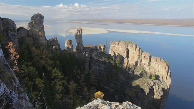 Lena Pillars cliff tops unique nature Russia Sakha Yakutia natural landscape serpentine river vertical stones. Reserve from great height. Forest taiga pine. Untouched wild. Mystical places of power