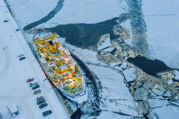 Top view of icebreaker in Arkhangelsk port on short winter day. Arkhangelsk Oblast, Russia.