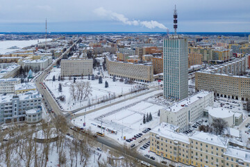 Aerial view of Lenin square with government buildings on winter day. Arkhangelsk, Russia.