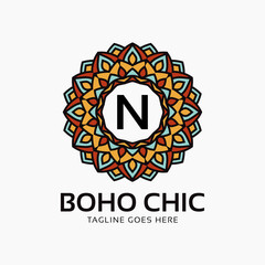 letter N boho chic round decoration vintage color mandala vector logo design element
