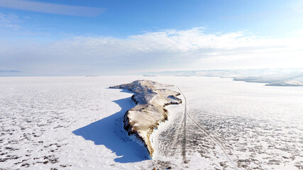 Lake Baikal Russia. Winter shooting. Sunny day. A sacred place. Ogoy Island. View from above.