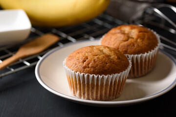 Healthy breakfast banana cake on black background