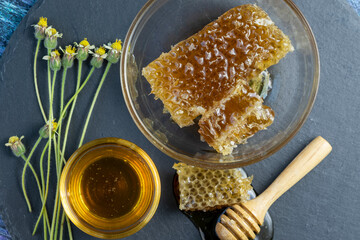 Sweet Honeycomb in wooden plate on wooden background, Natural honey with honeycomb