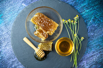 Sweet Honeycomb in wooden plate on wooden background, Natural honey with honeycomb