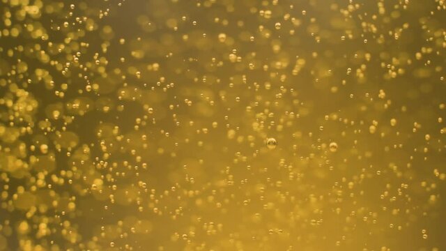 Super slow motion sparkling alcoholic drink, Macro shot gas bubbles Motion