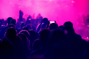 Crowd of people celebrating the New Year's Eve at a party
