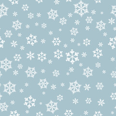Winter seamless pattern with white snowflakes on grey background. Vector illustration for fabric, textile wallpaper, posters, gift wrapping paper. Christmas vector illustration. Falling snow