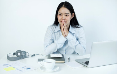 Asian woman Successful smiling businesswoman sitting working at the office