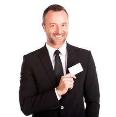 Portrait of a businessman holding blank credit card over white background