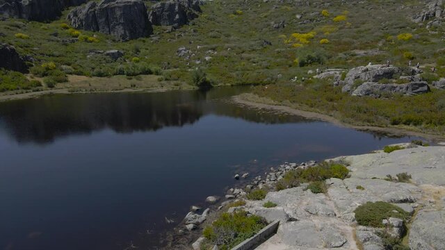 A drone pushes over tourists and the waters at Cov&atilde;o dos Conchos