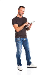 Smiling man working on tablet