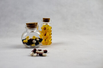 Transparent bottle and capsules