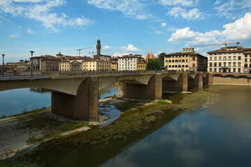 Obraz premium View of the bridge Ponte alle Grazie over the river Arno in Florence, Italy, Europe 