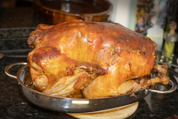 Crispy roasted turkey in the kitchen just before dressing for Christmas menu