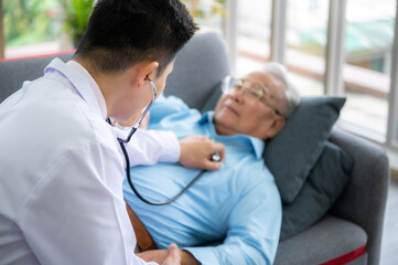 Obraz na płótnie Canvas old senior patient man visit doctor at hospital to medical health care check, health insurance