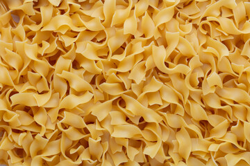 Raw pasta isolated on white background.