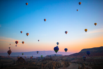 Bright hot air balloons in sky of Cappadocia, Turkey