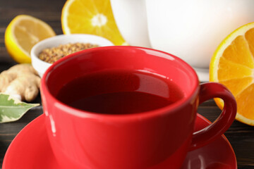 Concept of hot drink with tea, close up