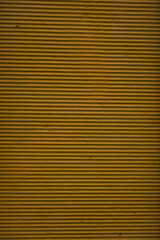 board texture, iron fence texture.  small details, dark orange corrugated surface.  close-up.  place for text.  Photo background