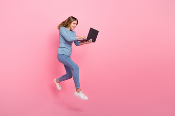 Full body profile side photo of young girl chat laptop walk jump repost comment button isolated...