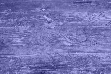 The texture of the tree is tinted in the trending color of 2022. Very peri. Pattern pattern of boards