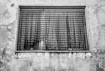 Broken and damaged window in an old house