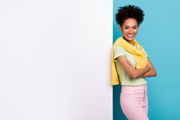 Profile side photo of young african cheerful girl folded hands paper poster promoter ads isolated...