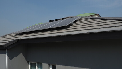 Photovoltaic. Solarcell panel. Solar roof power plant on the roof of a residential building. photo voltaic panels on house roof. Photovoltaic roof. Solar Energy concept. sustainable and clean power.
