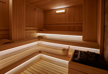 Fototapeta na wymiar Sauna interior concept, empty wooden steam room in hotel. Healthy and spa life style.