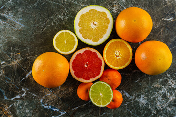 Citrus fruits. Oranges, lime, lemon, mandarins, citrus, pomelo, and grapefruit