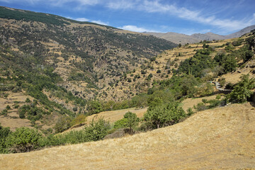 Fototapeta na wymiar The upper part of the Poqueira gorge, seen from Capileira