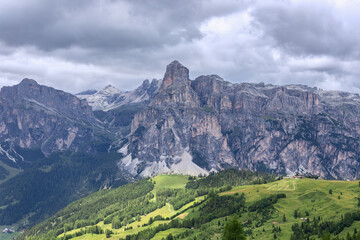 The mountain range of the Italian Dolomites and the majestic mountain Sassongher