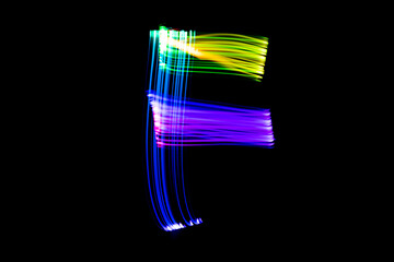 Letter F. Isolated figure on a black background. Freezelight.