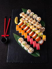 tasty sushi on the black background
