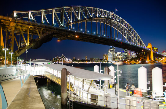 SYDNEY, AUSTRALIA. – On December 12, 2017. - Night photography of Milsons Point ferry wharf near Harbour bridge at North of Sydney.