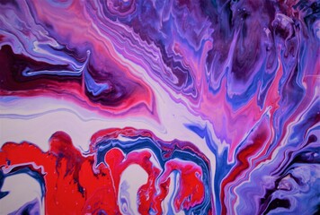 White-red-blue marble background. Acrylic texture with marble pattern. Mixing colors creates an interesting structure. It is well suited for laptop background and wallpaper, fabric